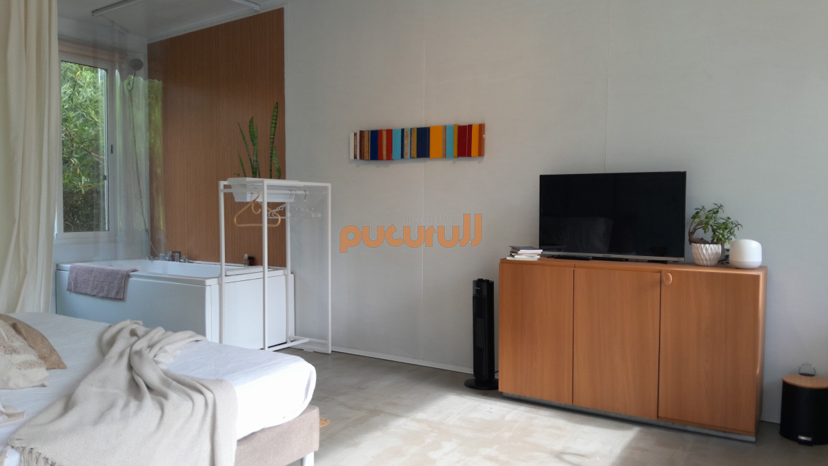 Casa ID.2117 - Mini loft con patio privado.