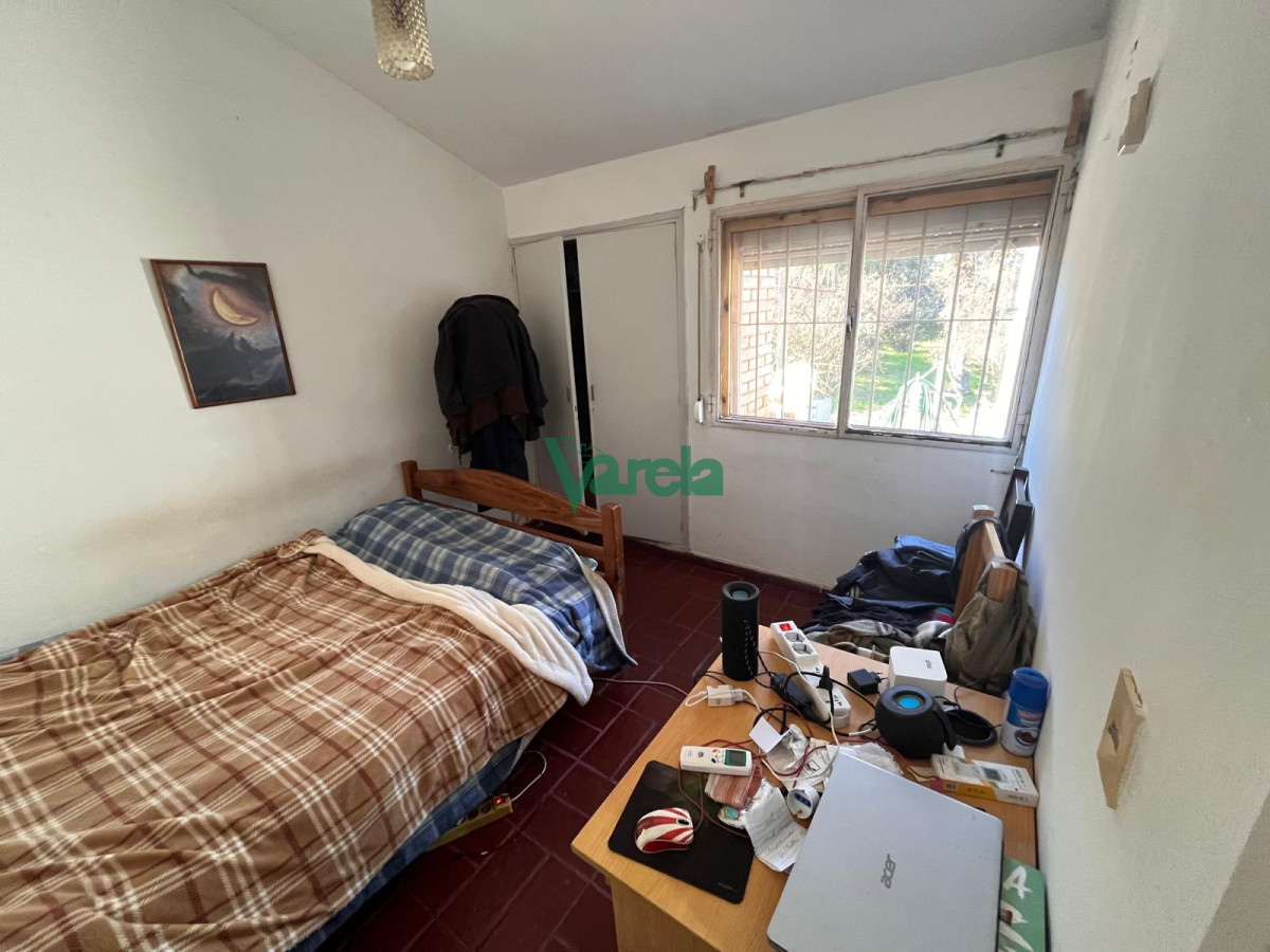 Casa ID.22687 - Venta casa en Solymar Sur, 2 dormitorios, living con hogar, fondo con parrillero y garage
