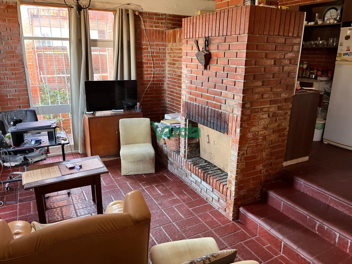 Casa ID.22687 - Venta casa en Solymar Sur, 2 dormitorios, living con hogar, fondo con parrillero y garage