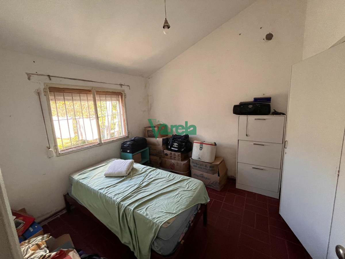 Casa ID.22687 - Venta casa en Solymar Sur, 2 dormitorios, living con hogar, fondo con parrillero y garage