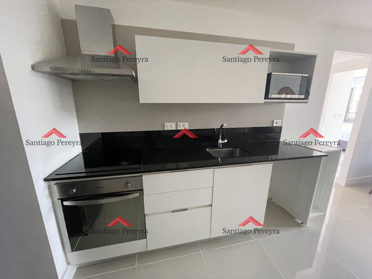Apartamento ID.14436 - Apartamento de dos dormitorios en venta, piscina climatizada, mucama, barbacoa, sala de cine