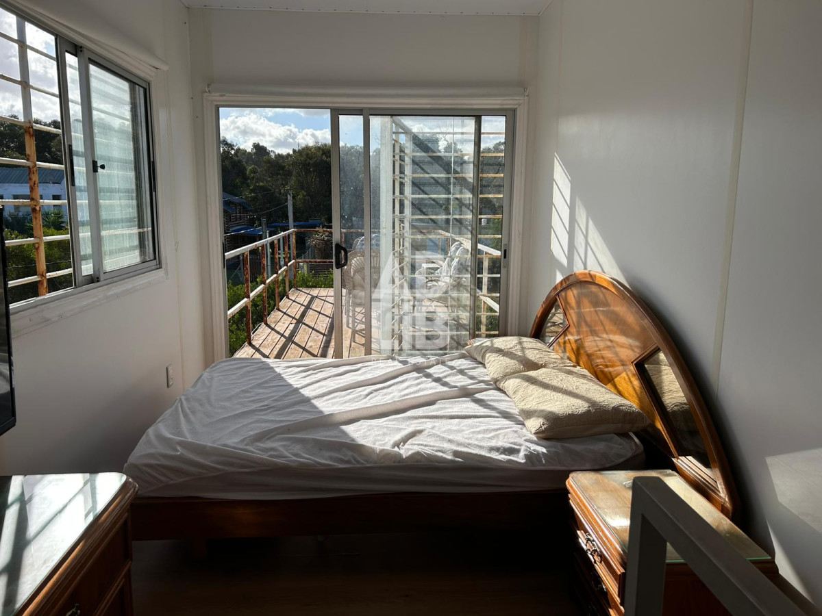 Casa ID.400 - Casa container con títulos en Sauce de Portezuelo con vista al Mar. 2 dormitorios