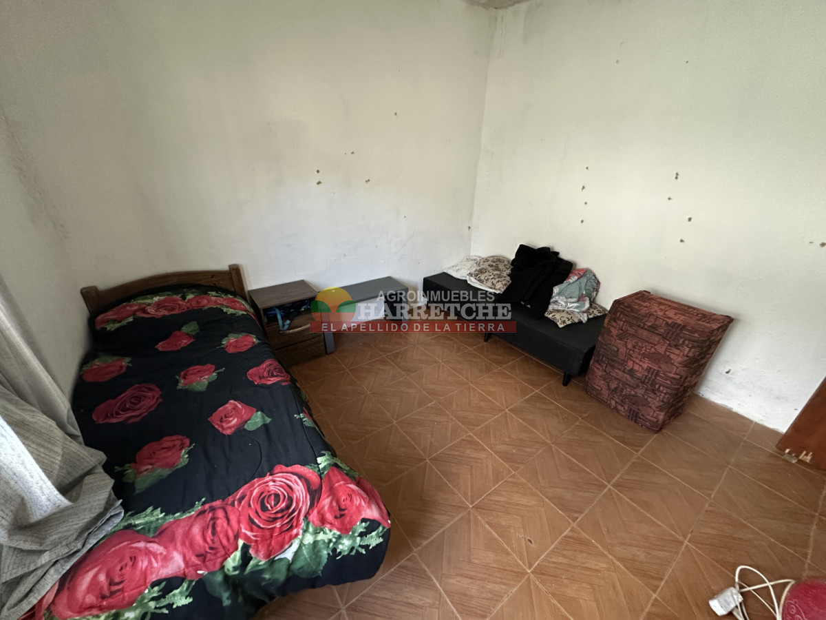Casa ID.540 - Vendo casa en 18 de Mayo, 2 dormitorio, parrillero, alero