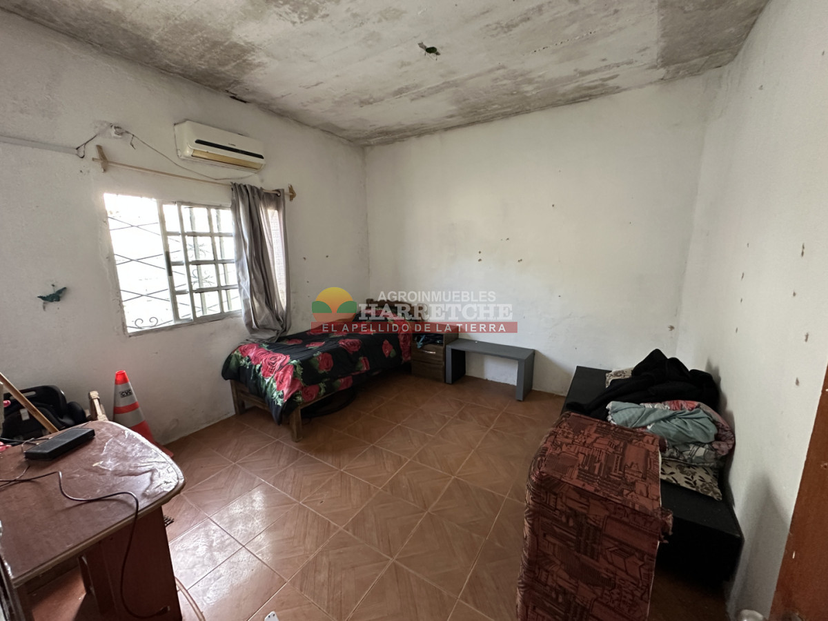 Casa ID.540 - Vendo casa en 18 de Mayo, 2 dormitorio, parrillero, alero