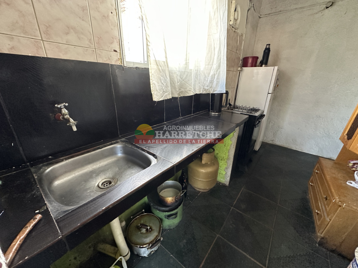 Casa ID.540 - Vendo casa en 18 de Mayo, 2 dormitorio, parrillero, alero