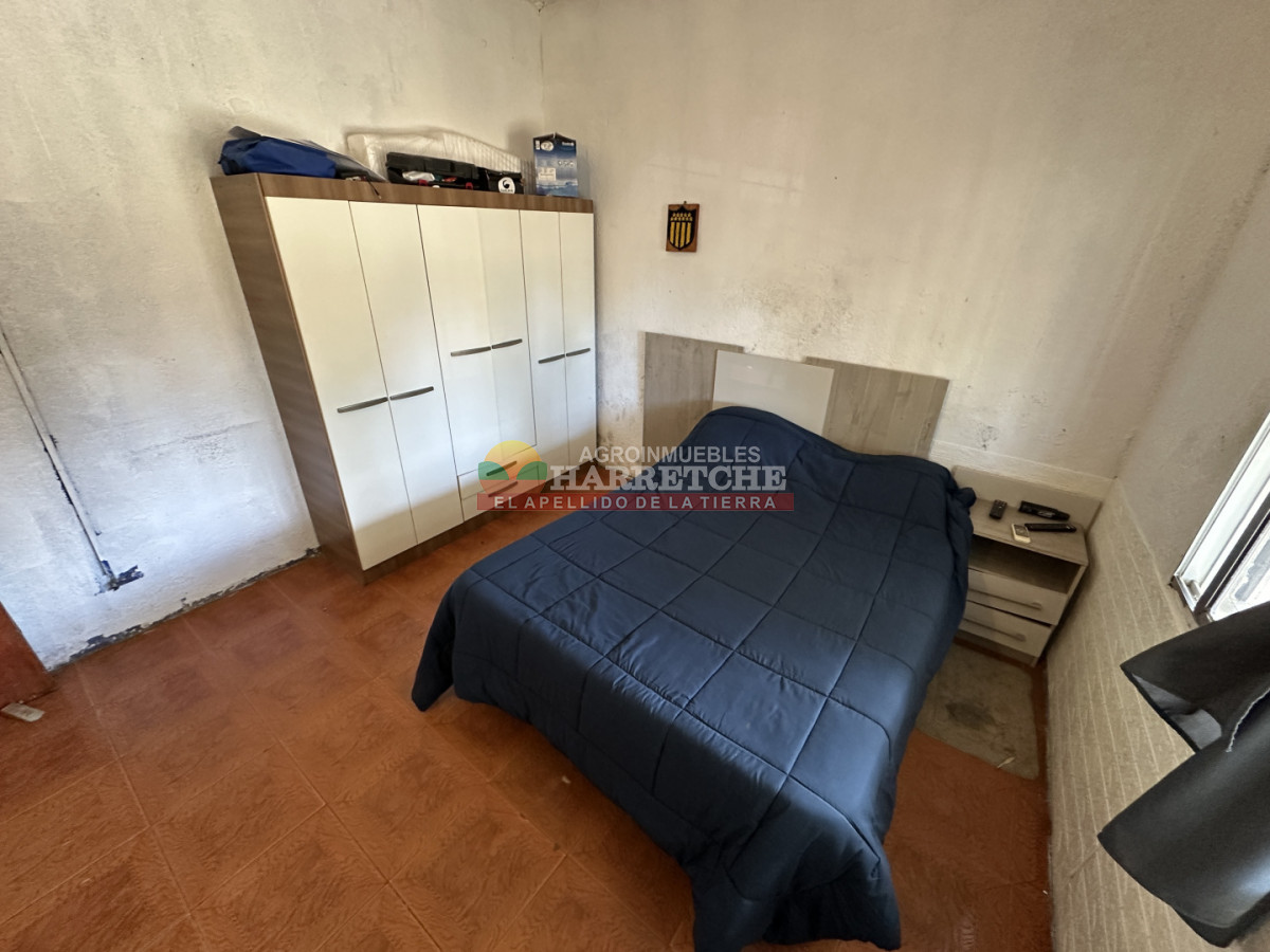 Casa ID.540 - Vendo casa en 18 de Mayo, 2 dormitorio, parrillero, alero