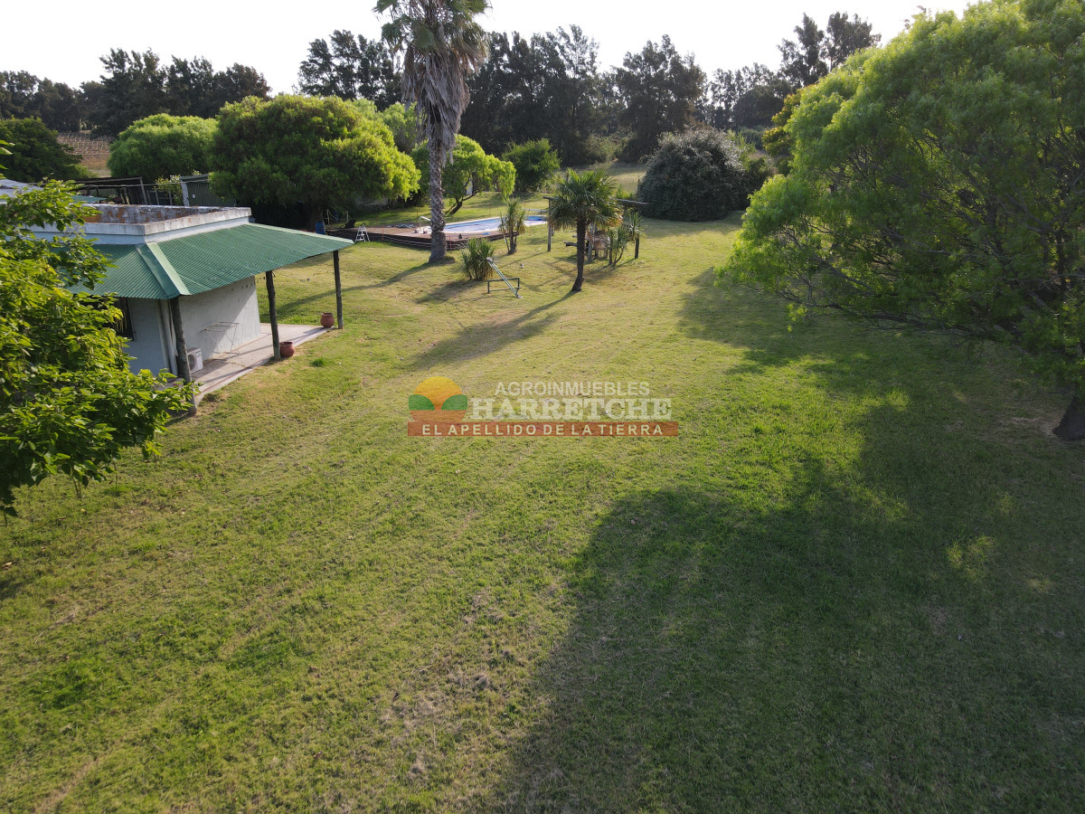 Chacra ID.448 - Chacra en Melilla, 10 has, casco de 3 dormitorios, 2 baños, piscina, galpón.