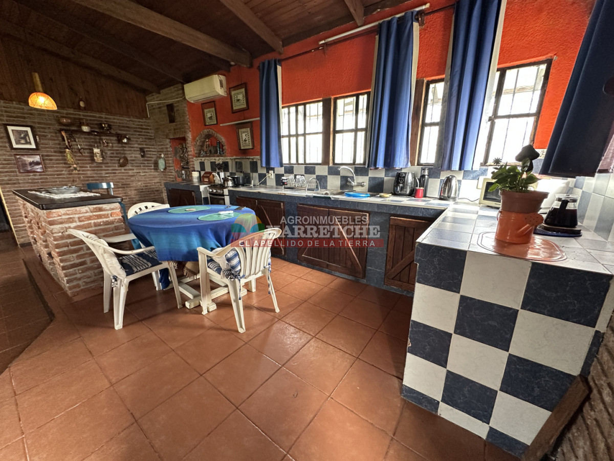 Chacra ID.536 - Chacra en Villa Nueva, hermosa casa, 4 dorm, 2 baños, amplios espacios