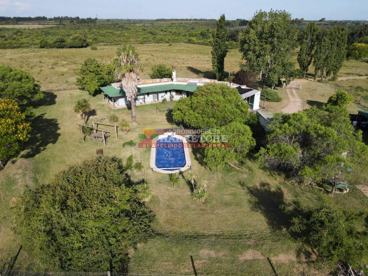 Chacra ID.448 - Chacra en Melilla, 10 has, casco de 3 dormitorios, 2 baños, piscina, galpón.