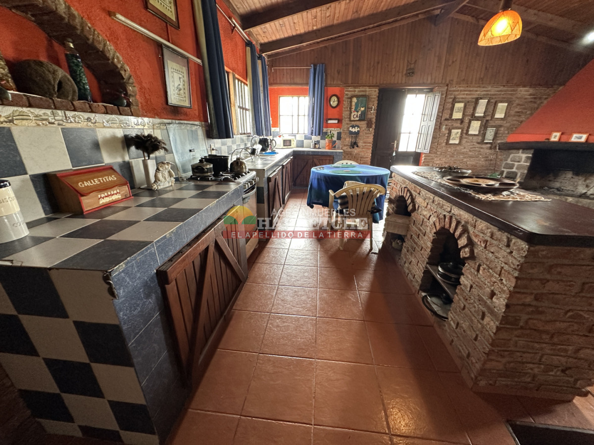Chacra ID.536 - Chacra en Villa Nueva, hermosa casa, 4 dorm, 2 baños, amplios espacios