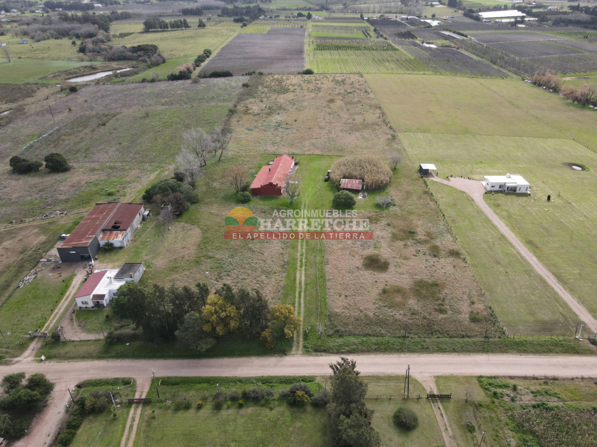 Chacra ID.536 - Chacra en Villa Nueva, hermosa casa, 4 dorm, 2 baños, amplios espacios