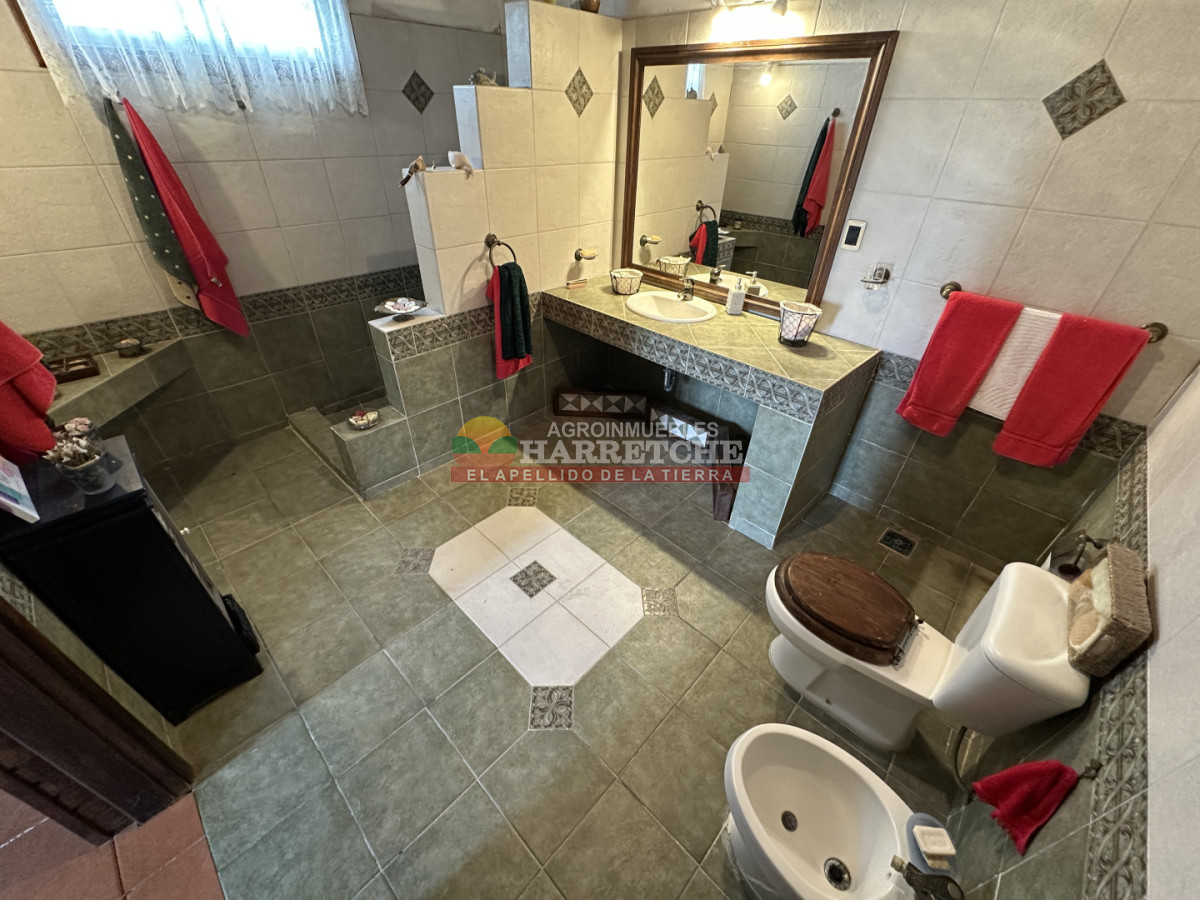 Chacra ID.536 - Chacra en Villa Nueva, hermosa casa, 4 dorm, 2 baños, amplios espacios