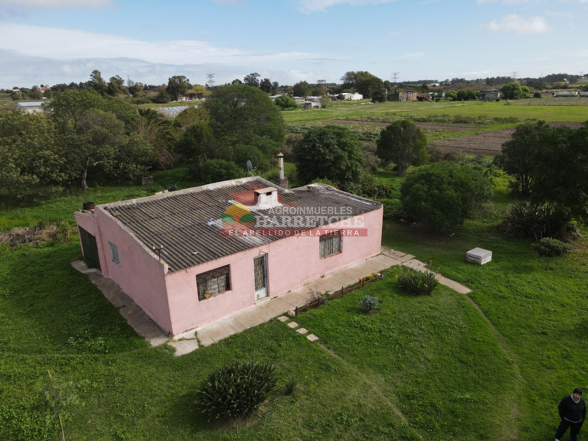 Terreno ID.310 - Casa con terreno en venta a pasitos de ruta 1, 7395 m2, Paso de la Arena.