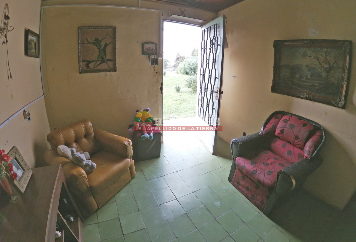 Terreno ID.310 - Casa con terreno en venta a pasitos de ruta 1, 7395 m2, Paso de la Arena.