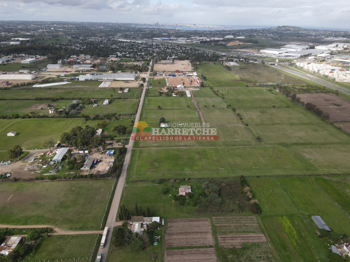 Terreno ID.310 - Casa con terreno en venta a pasitos de ruta 1, 7395 m2, Paso de la Arena.