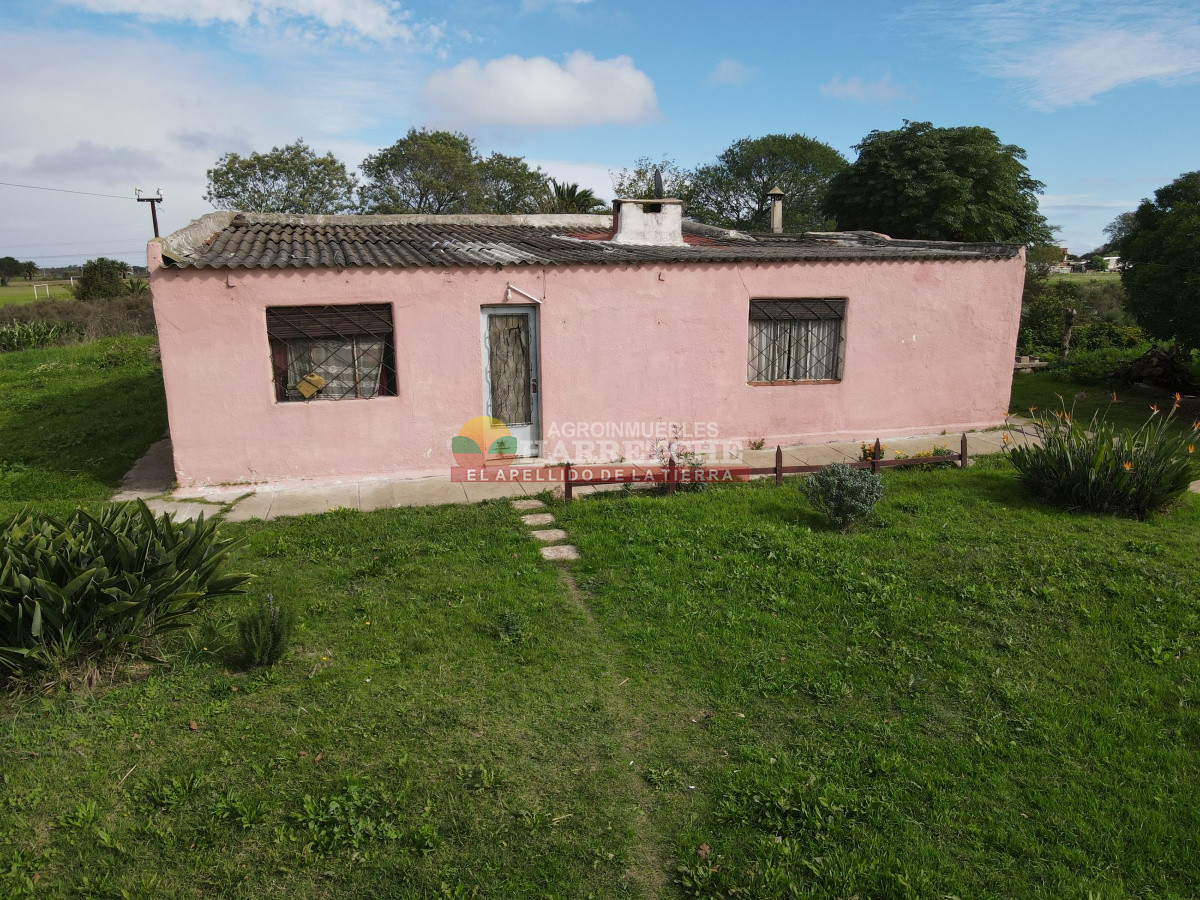 Terreno ID.310 - Casa con terreno en venta a pasitos de ruta 1, 7395 m2, Paso de la Arena.