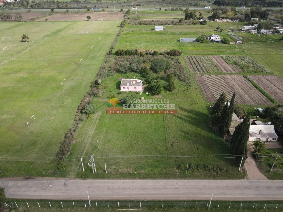 Terreno ID.310 - Casa con terreno en venta a pasitos de ruta 1, 7395 m2, Paso de la Arena.