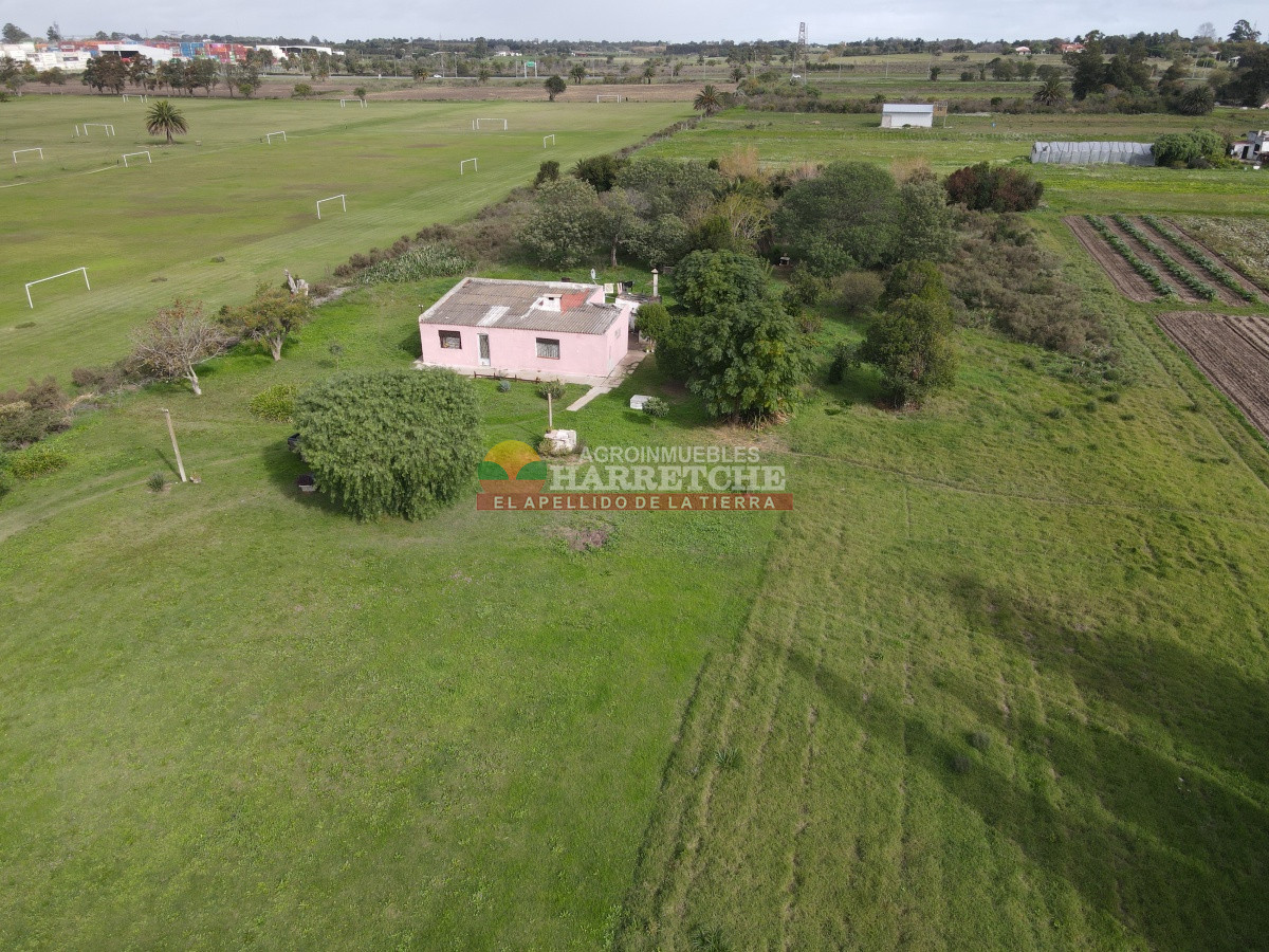 Terreno ID.310 - Casa con terreno en venta a pasitos de ruta 1, 7395 m2, Paso de la Arena.
