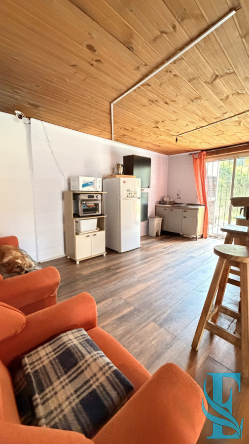 Casa ID.1005 - EN VENTA CASA DE MADERA EN PORTEZUELO 