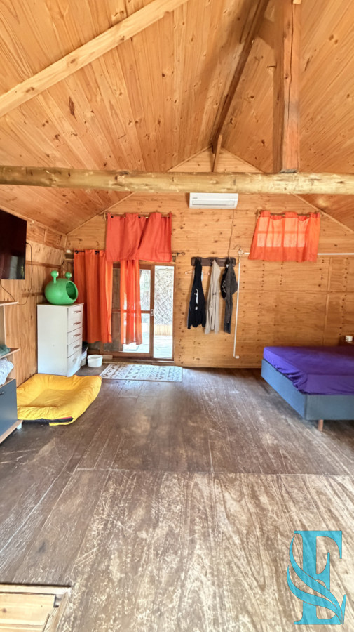 Casa ID.1005 - EN VENTA CASA DE MADERA EN PORTEZUELO 