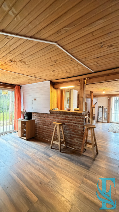 Casa ID.1005 - EN VENTA CASA DE MADERA EN PORTEZUELO 
