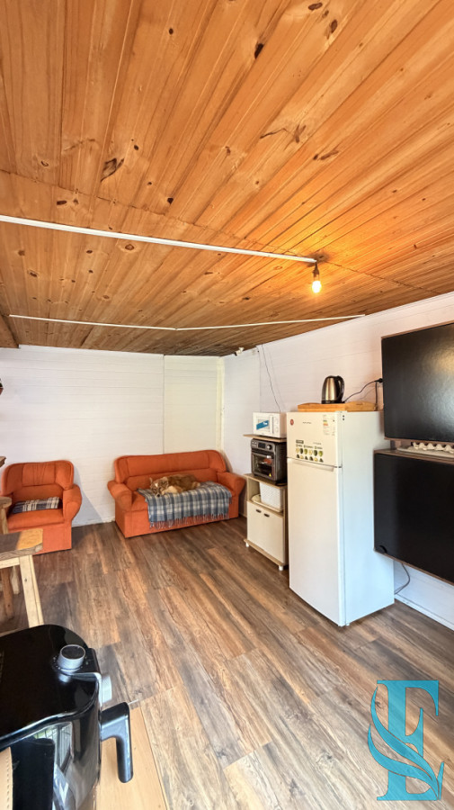 Casa ID.1005 - EN VENTA CASA DE MADERA EN PORTEZUELO 