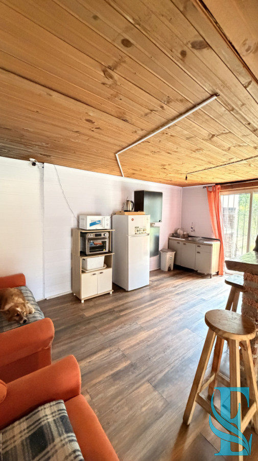 Casa ID.1005 - EN VENTA CASA DE MADERA EN PORTEZUELO 