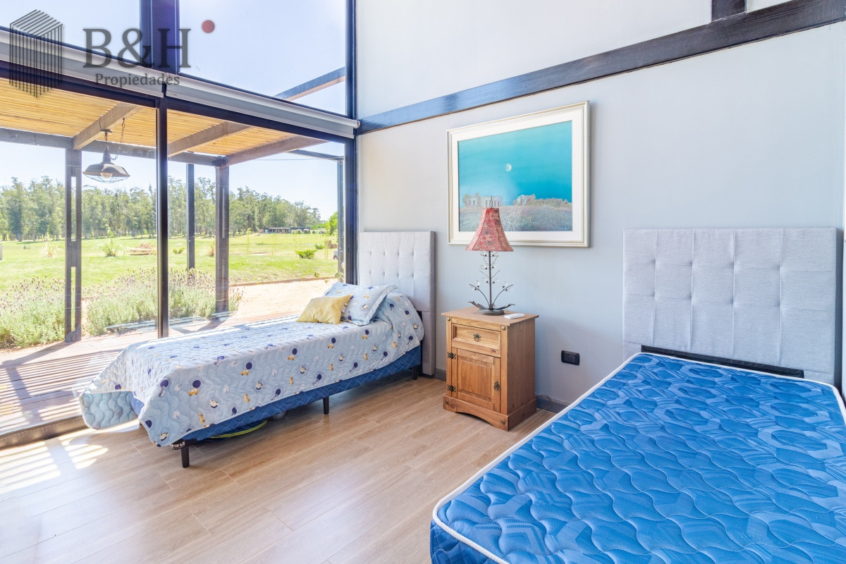 Casa ID.6009 - Moderna casa en barrio privado El Quijote en venta