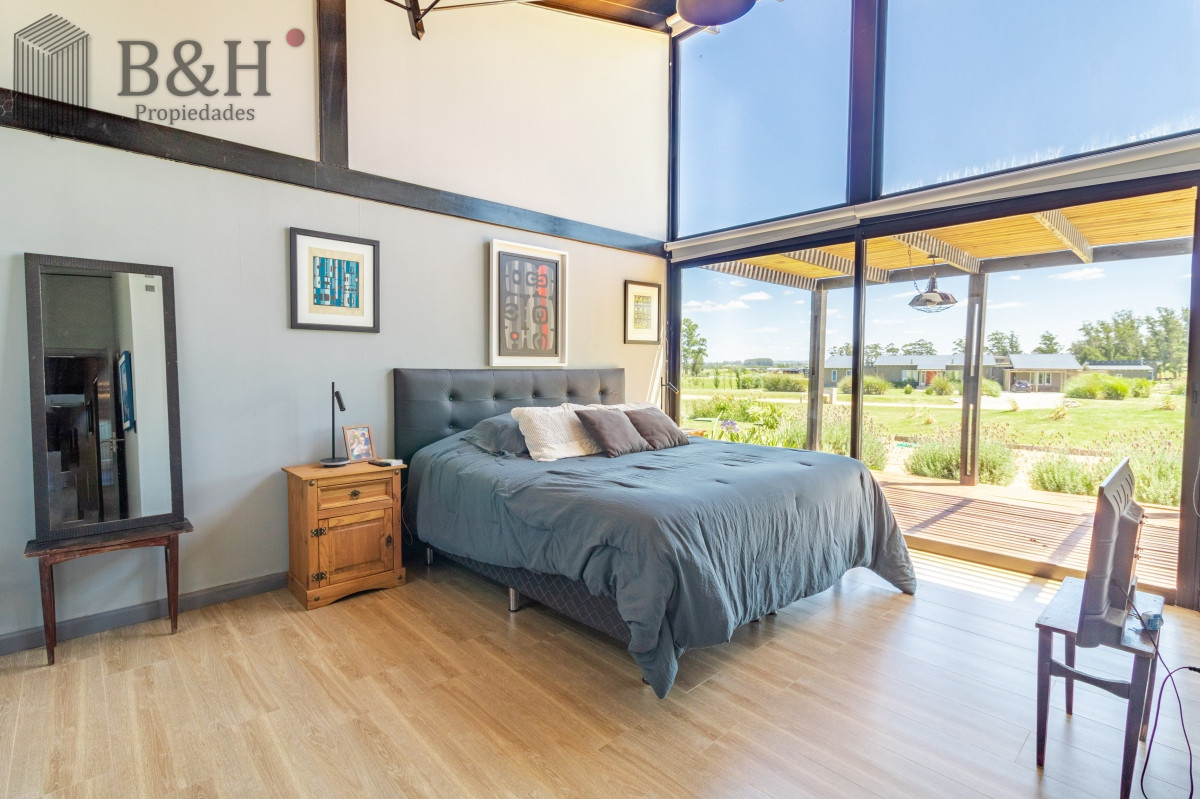 Casa ID.6009 - Moderna casa en barrio privado El Quijote en venta