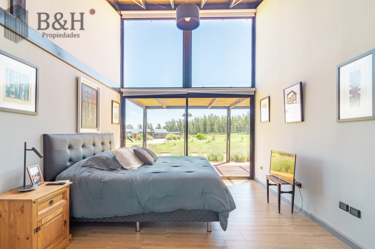 Casa ID.6009 - Moderna casa en barrio privado El Quijote en venta