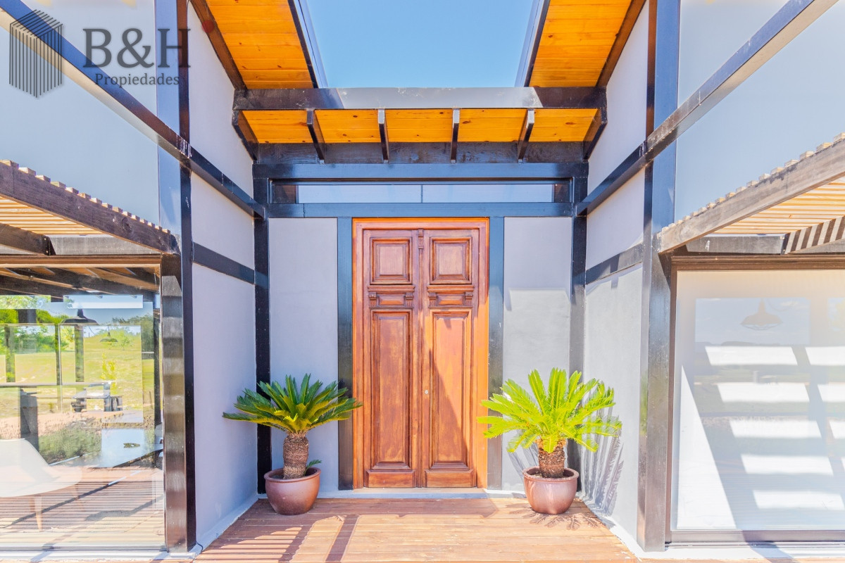 Casa ID.6009 - Moderna casa en barrio privado El Quijote en venta
