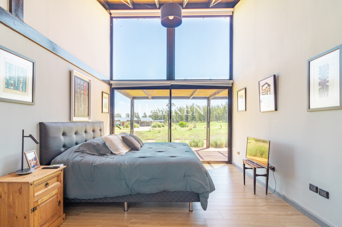 Casa ID.214 - Moderna casa en barrio privado El Quijote en venta