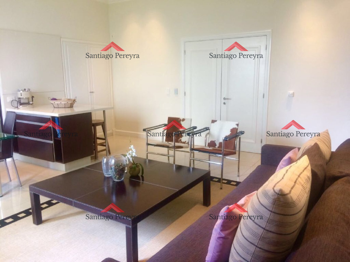 Apartamento ID.4999 - Unico departamento de un dormitorio en edificio de categoria, sobre playa brava con 2 garages,