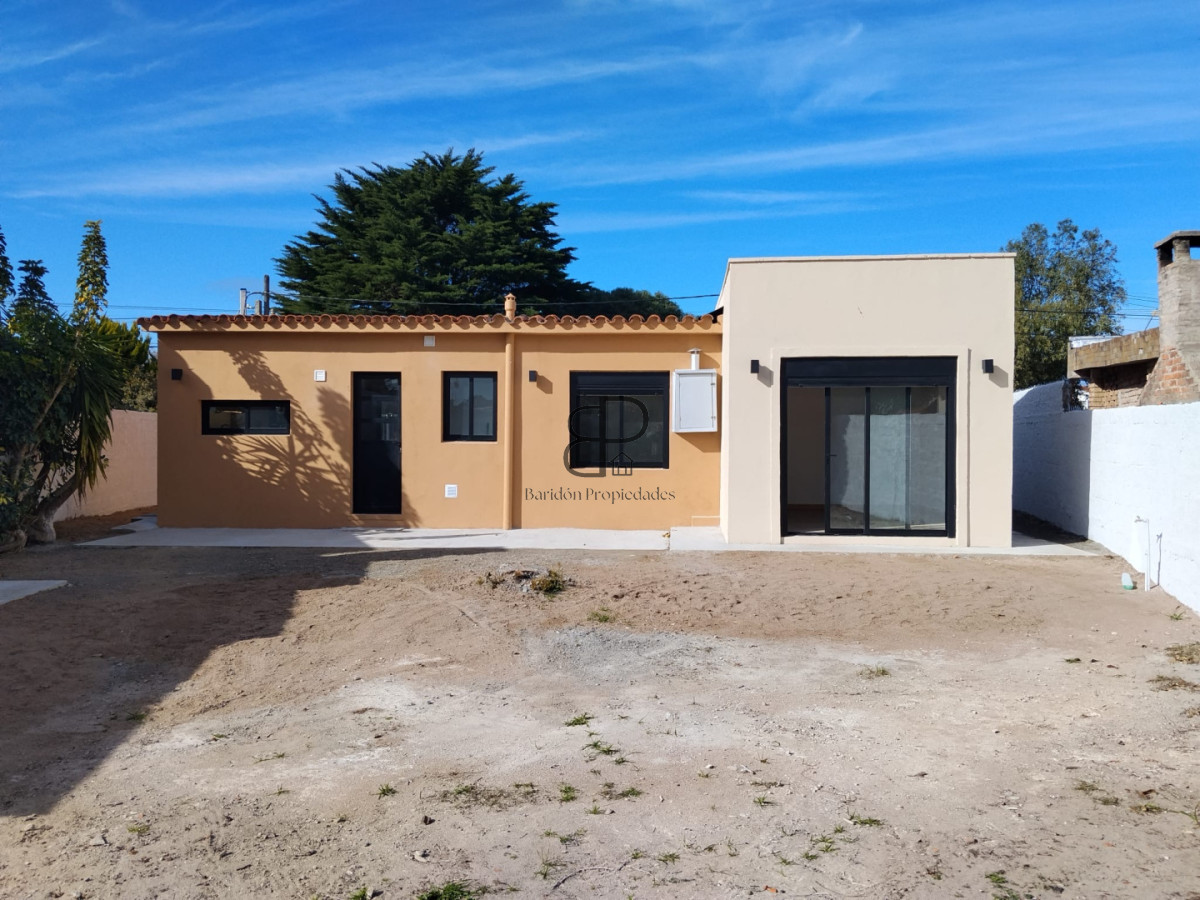 Casa ID.7031 - Venta Casa 3 Dormitorios Lagomar con fondo con parrillero