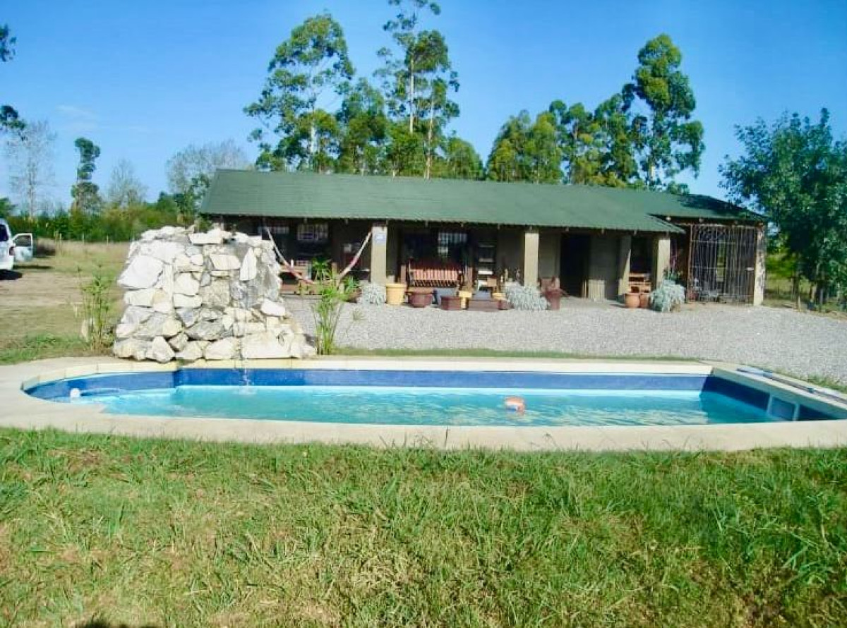 Chacra ID.3556 - Venta Terreno 3 hectáreas 2 Casas y Piscina Inversión Pando