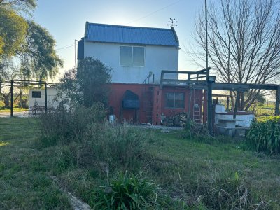 Chacra de 5 hectáreas con dos casas en zona muy tranquila