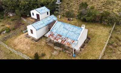 14 hectáreas y media con población y arroyito en el fondo