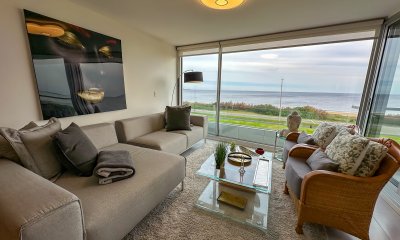 Exclusivo departamento en primera línea de Playa Mansa