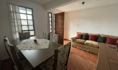 CASA EN COOPEERATIVA CON ENTRADA LATERAL DE VEHICULOS