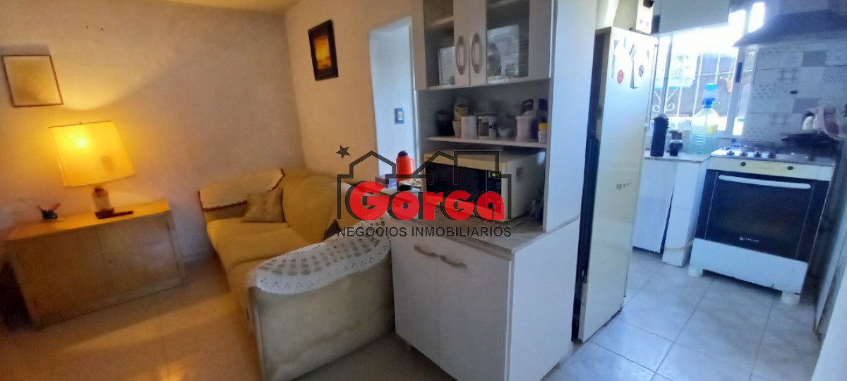 Casa ID.52 - Casa con jardín en L, 2 dormitorios, living comedor, cocina y baño. Oportunidad!!