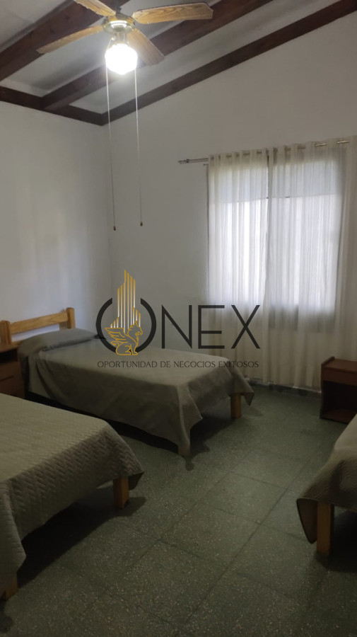 Casa ID.4406 - SE VENDE EXCELENTE PROPIEDAD EN ATLANTIDA, DE CUATRO DORMITORIOS