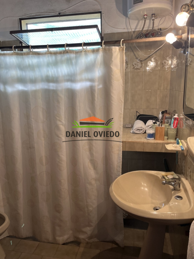 Casa ID.130 - Casa en venta con aptitud comercial en el centro de Nueva Helvecia.