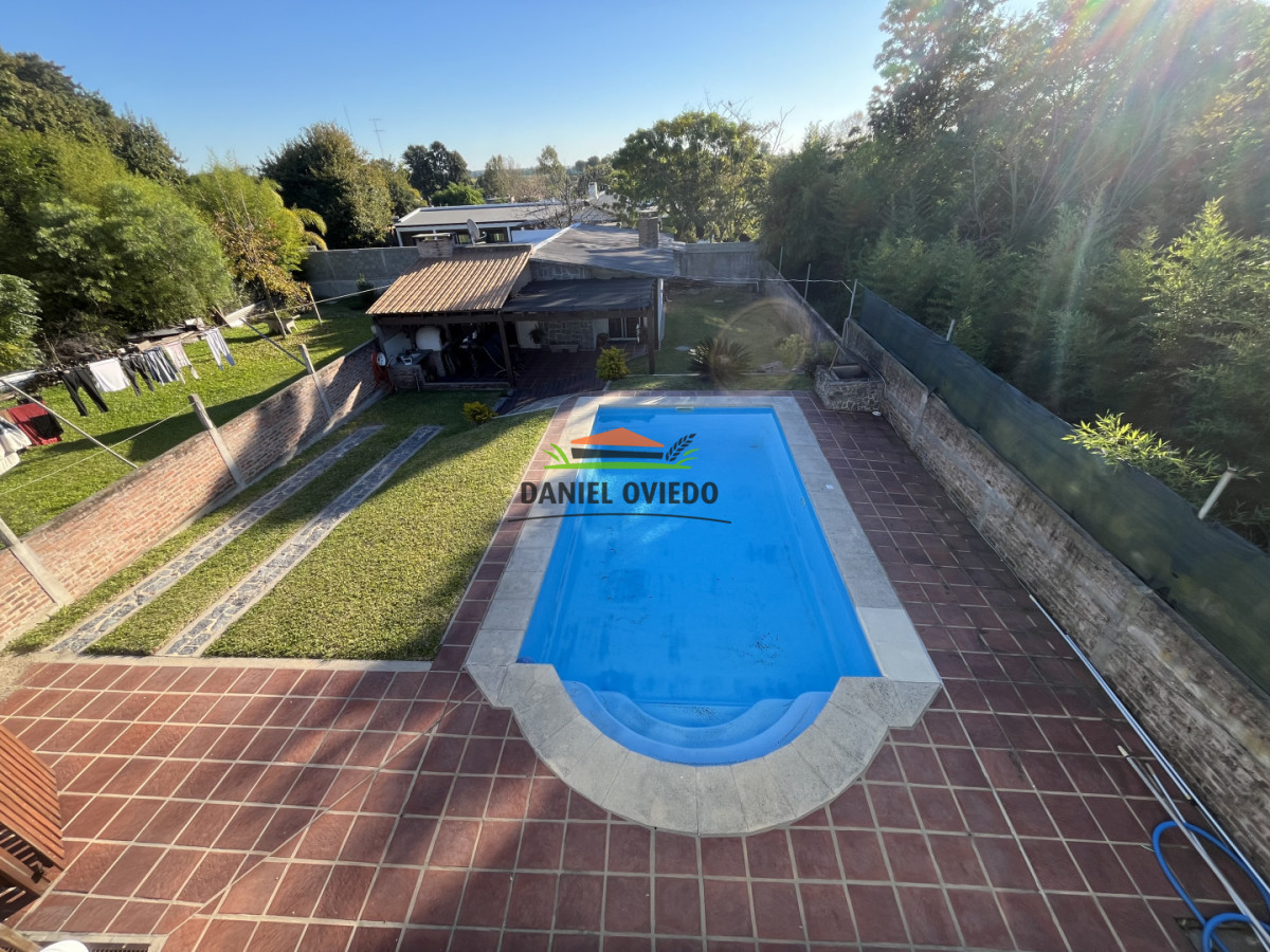 Casa ID.355/Excelente-propiedad-con-piscina,-barbacoa-y-garaje-en-Nueva-Helvecia - Excelente propiedad con piscina, barbacoa y garaje en Nueva Helvecia