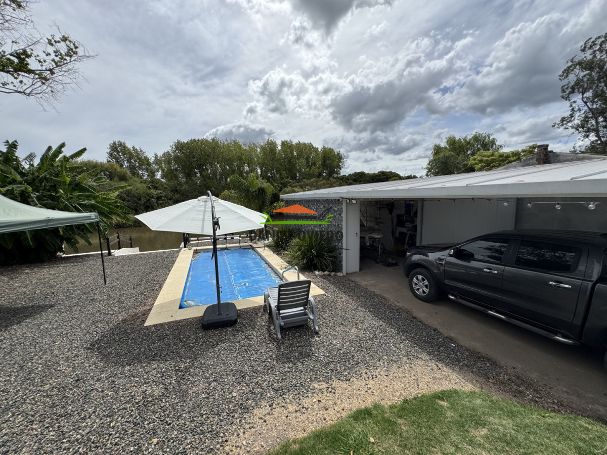 Casa ID.343/Excelente-casa-en-venta-con-piscina-y-muelle-a-arroyo-en-Boca-del-Cufré. - Excelente casa en venta con piscina y muelle a arroyo en Boca del Cufré.