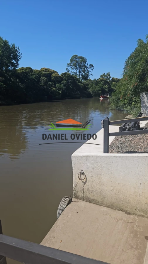 Casa ID.343/Excelente-casa-en-venta-con-piscina-y-muelle-a-arroyo-en-Boca-del-Cufr - Excelente casa en venta con piscina y muelle a arroyo en Boca del Cufré.