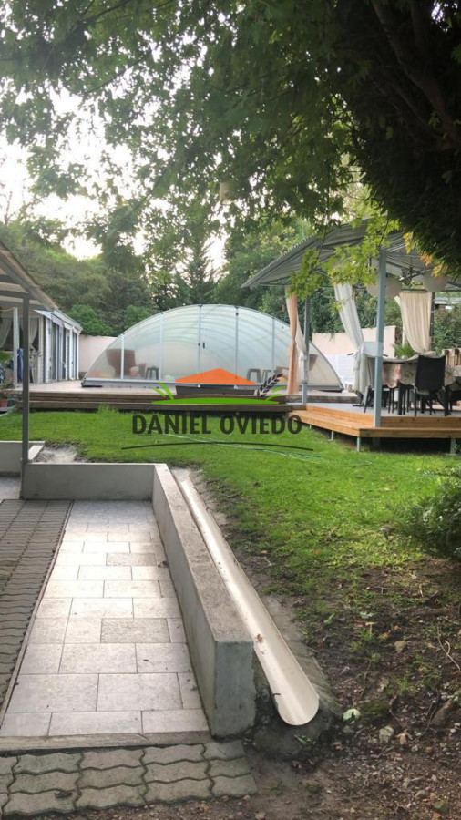 Casa ID.203 - Hermosa casa con piscina climatizada cerrada en venta en Nueva Helvecia.