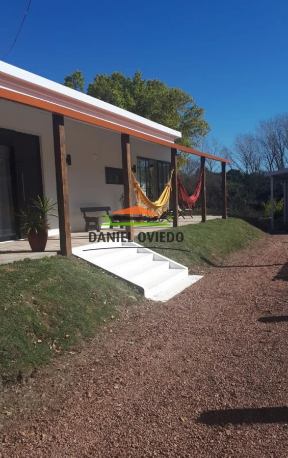 Casa ID.343/Excelente-casa-en-venta-con-piscina-y-muelle-a-arroyo-en-Boca-del-Cufr - Excelente casa en venta con piscina y muelle a arroyo en Boca del Cufré.