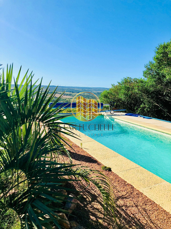 Chacra ID.41 - Chacra de 7 hectáreas con 2 casas, piscina, invernáculos en Venta