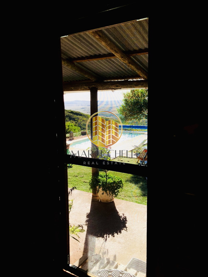 Chacra ID.41 - Chacra de 7 hectáreas con 2 casas, piscina, invernáculos en Venta