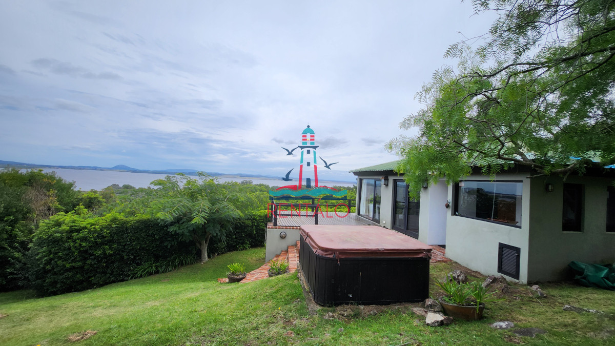 Casa ID.198 - Casa en venta 4 dormitorios en Las Cumbres vista a la Laguna del Sauce
